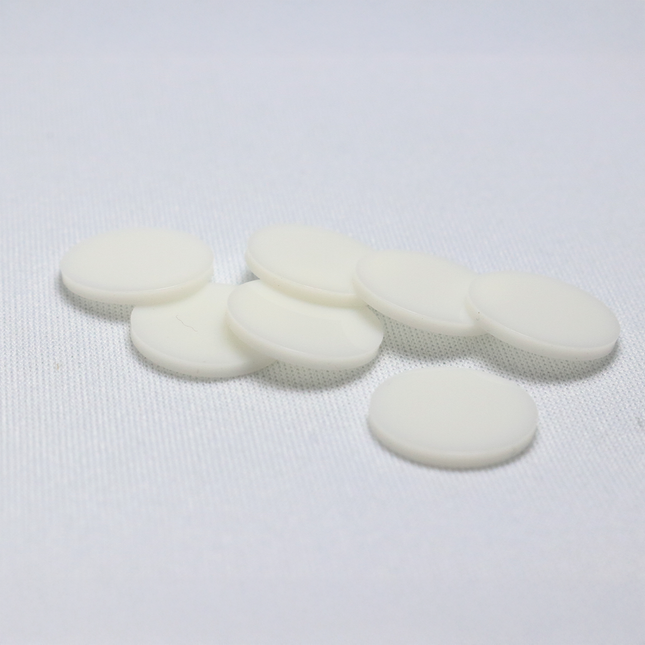 Image of C66U1313C - Septa, CHROMSPEC ULB, 13 mm x 1.3 mm Thick, Clear PTFE/White Ultra Low Bleed Silicone, For GC/MS & LC/MS, 20 Packages