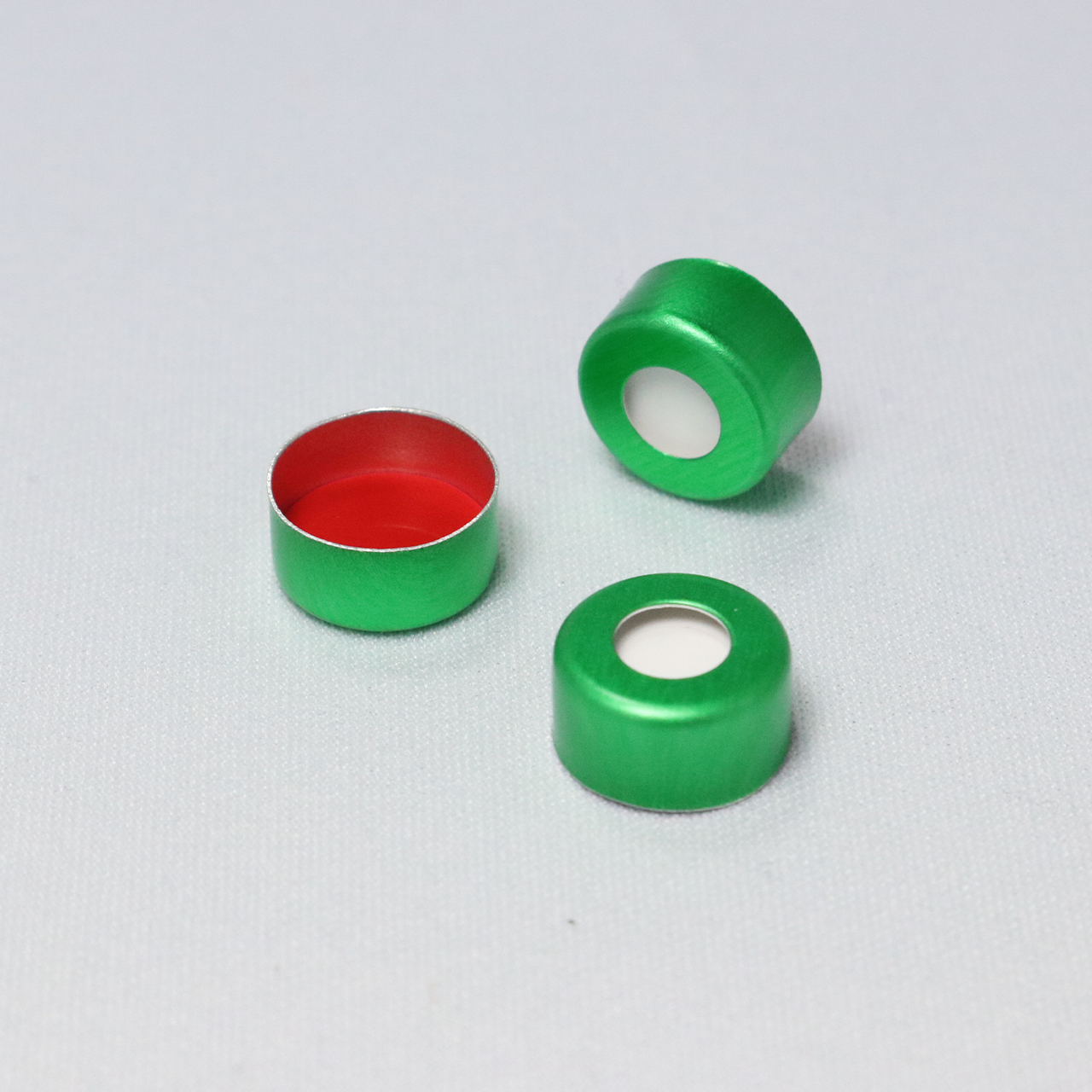 Crimp Cap CHROMSPEC 11mm Green Aluminum, Open Top, with 0.040" Thick Red PTFE/White Silicone Septum, Minimum Order Quantity of 20 Packages