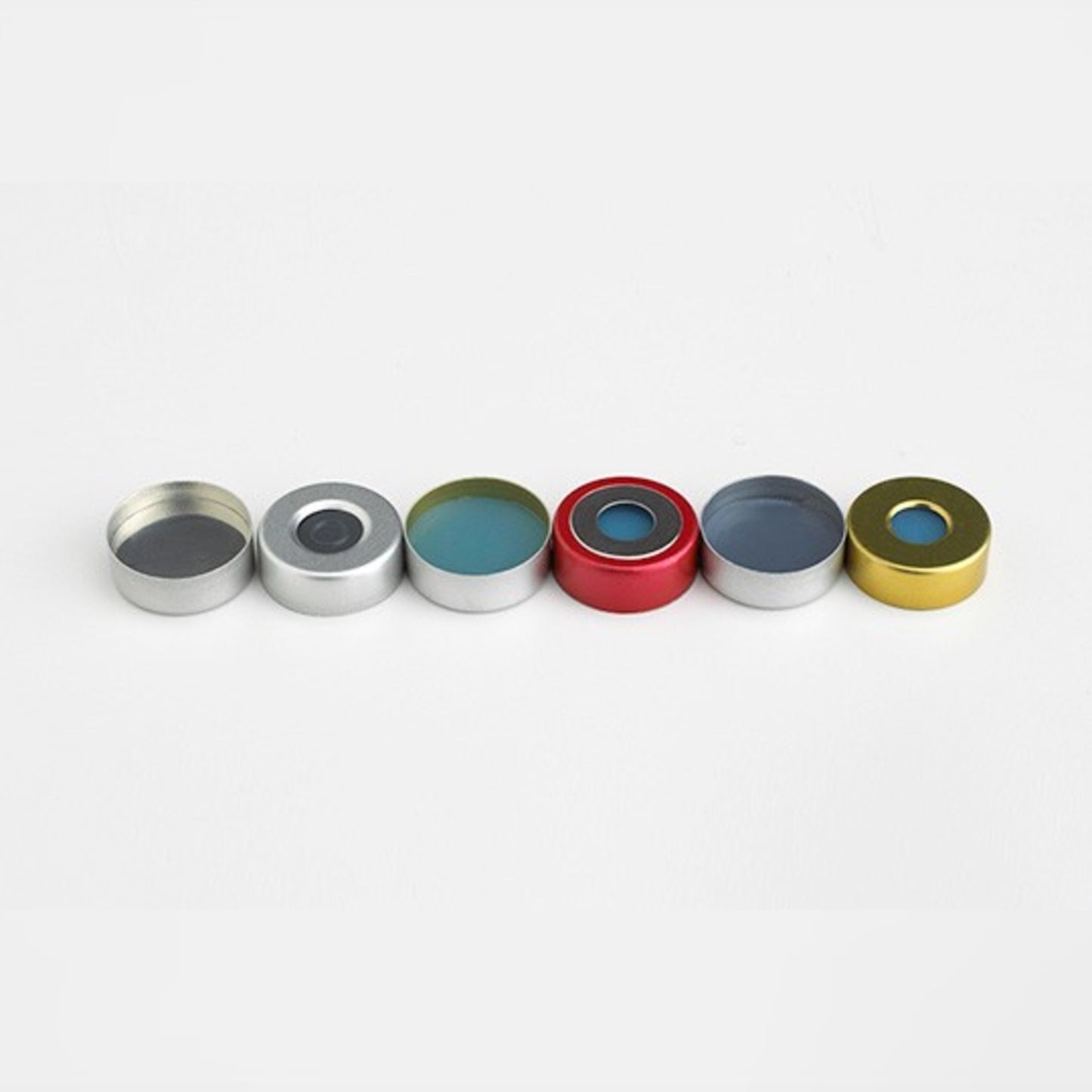Image of C2220M34 - 20 mm Silver Steel Magnetic Crimp Cap, 8 mm Center Hole, with 3 mm Thick Transparent Blue Silicone/White PTFE Septa, 50 Packages