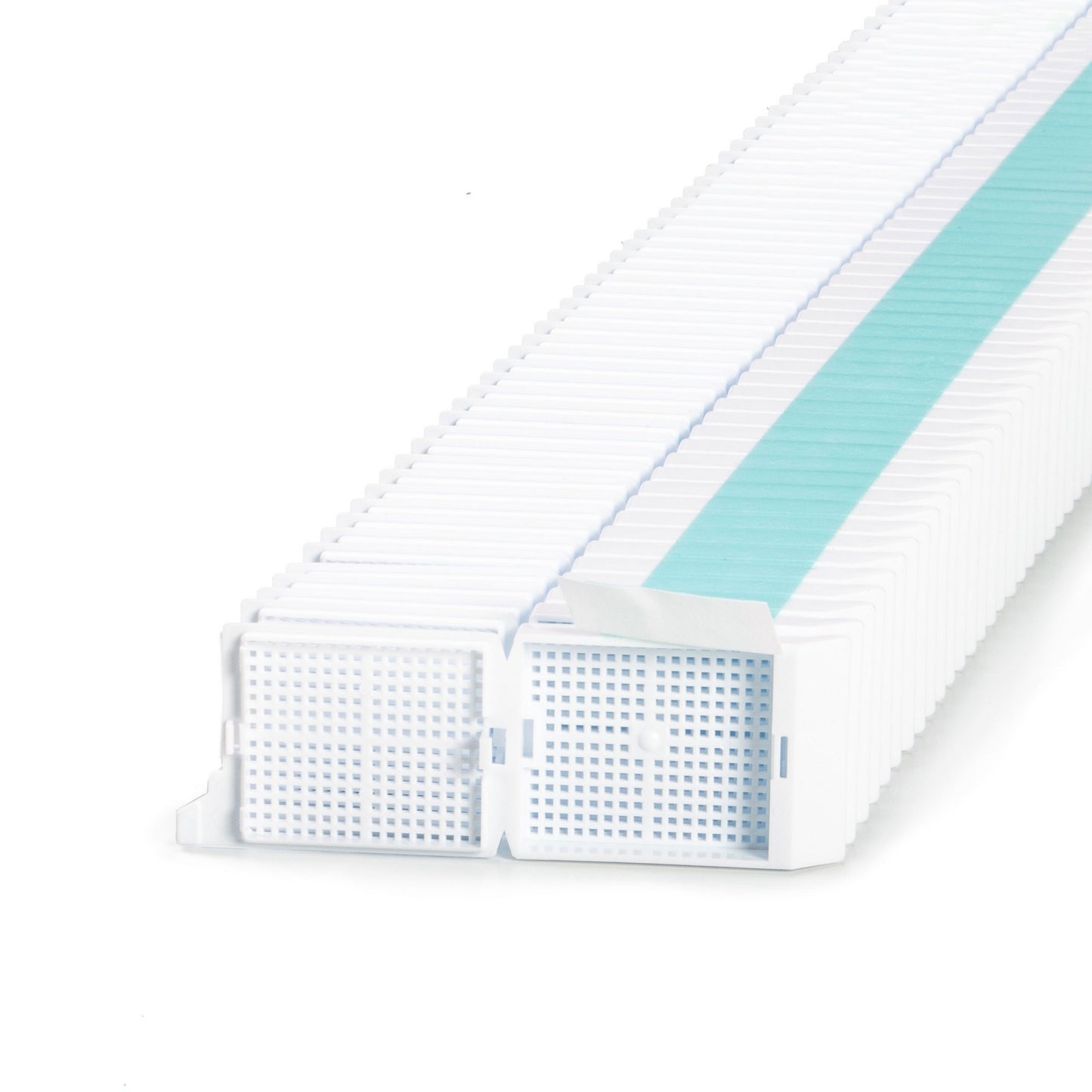 Unisette™ Biopsy cassettes in Quickload™ Stack (Taped), White